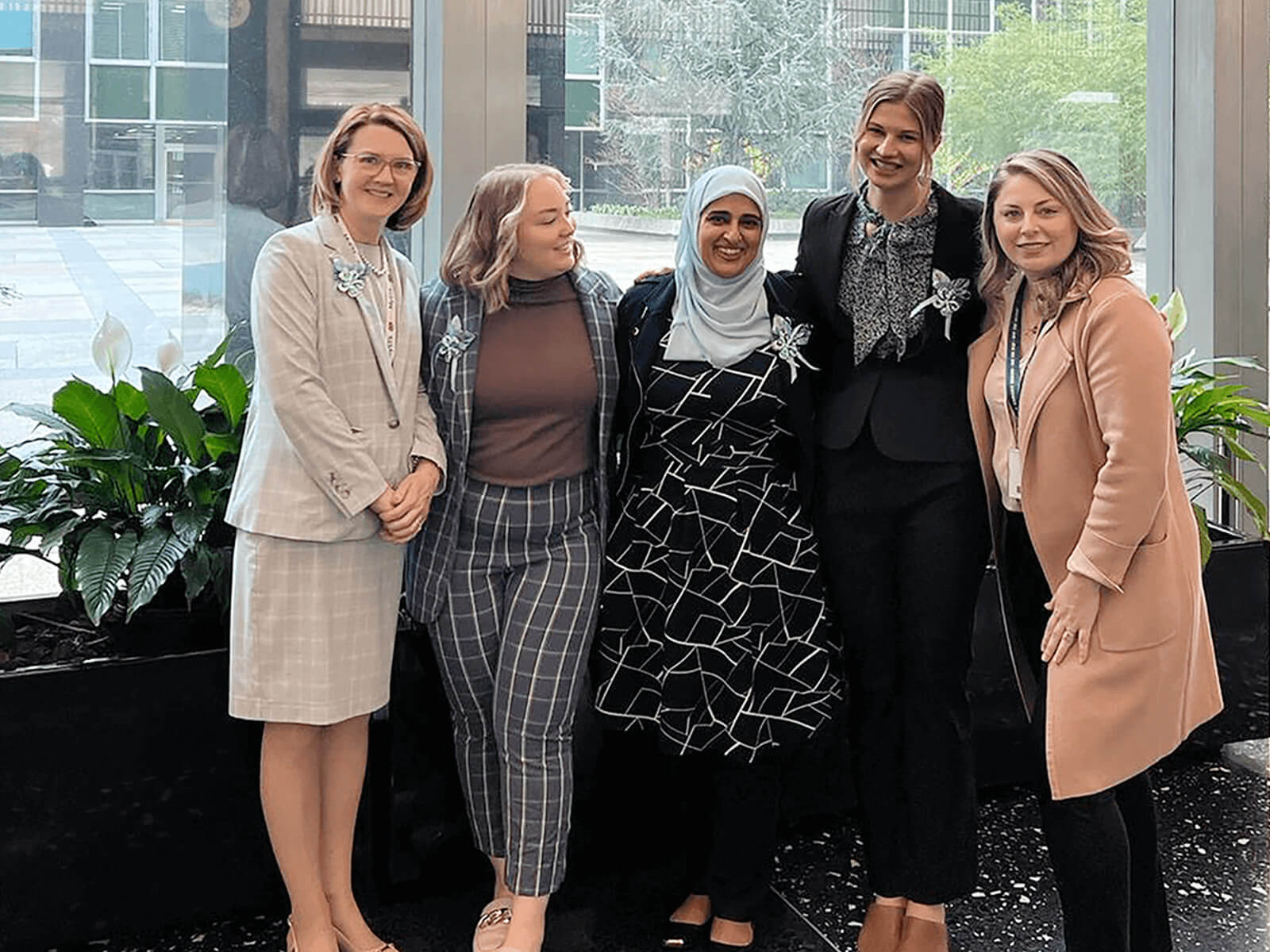 A group of women posing for a photo