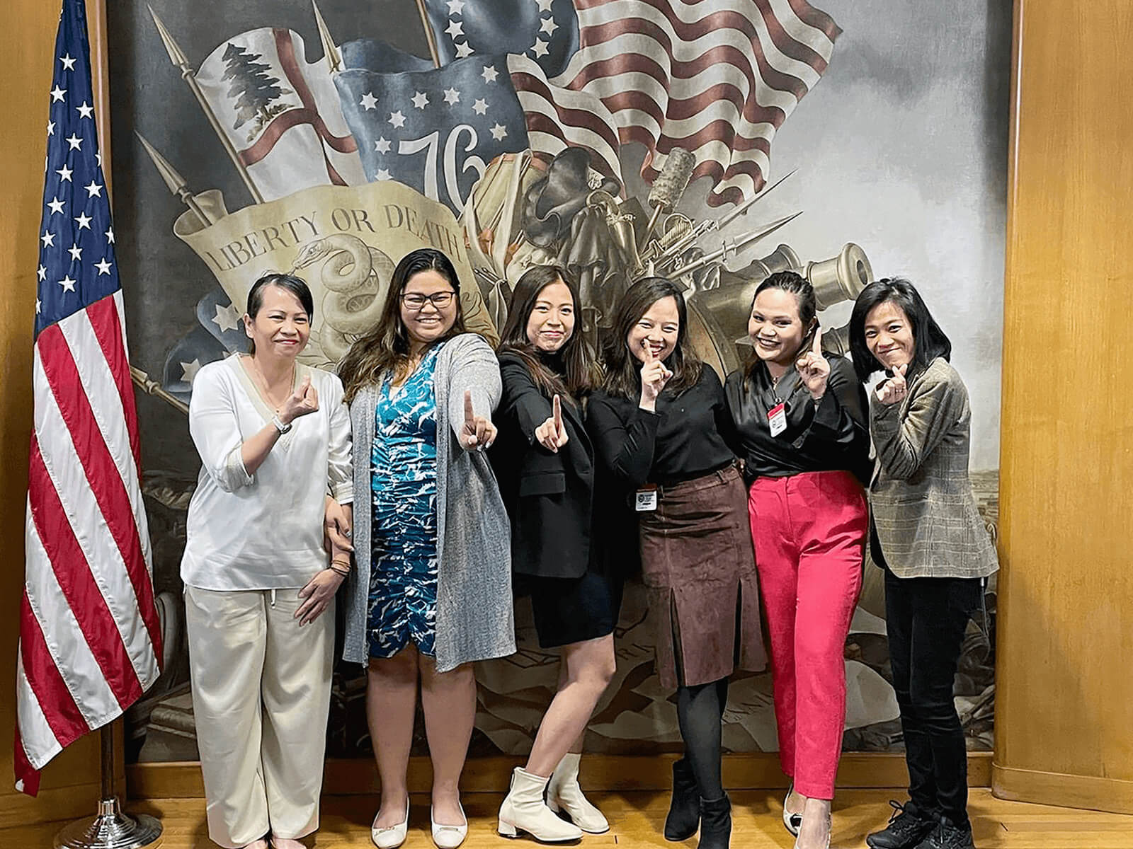 A group of women posing for a photo