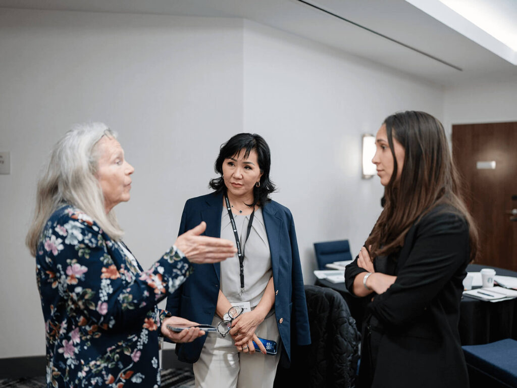 A group of women speaking to each other